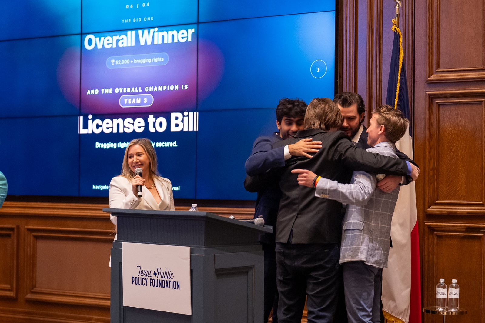 The winning team hugging each other after being announced overall champion