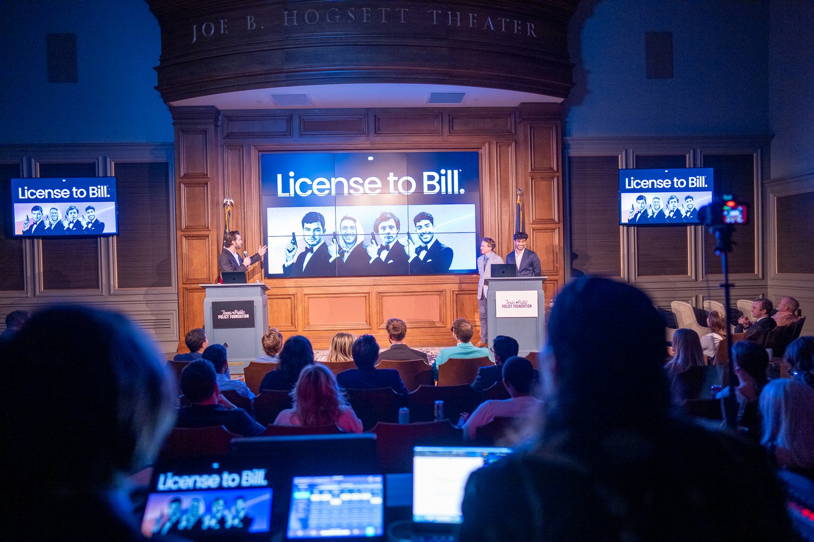 The 'License to Bill' branded winner screens on stage at the Joe B. Hogsett Theater