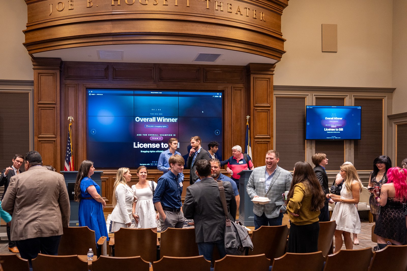 Guests mingling under the Joe B. Hogsett Theater marquee after the event