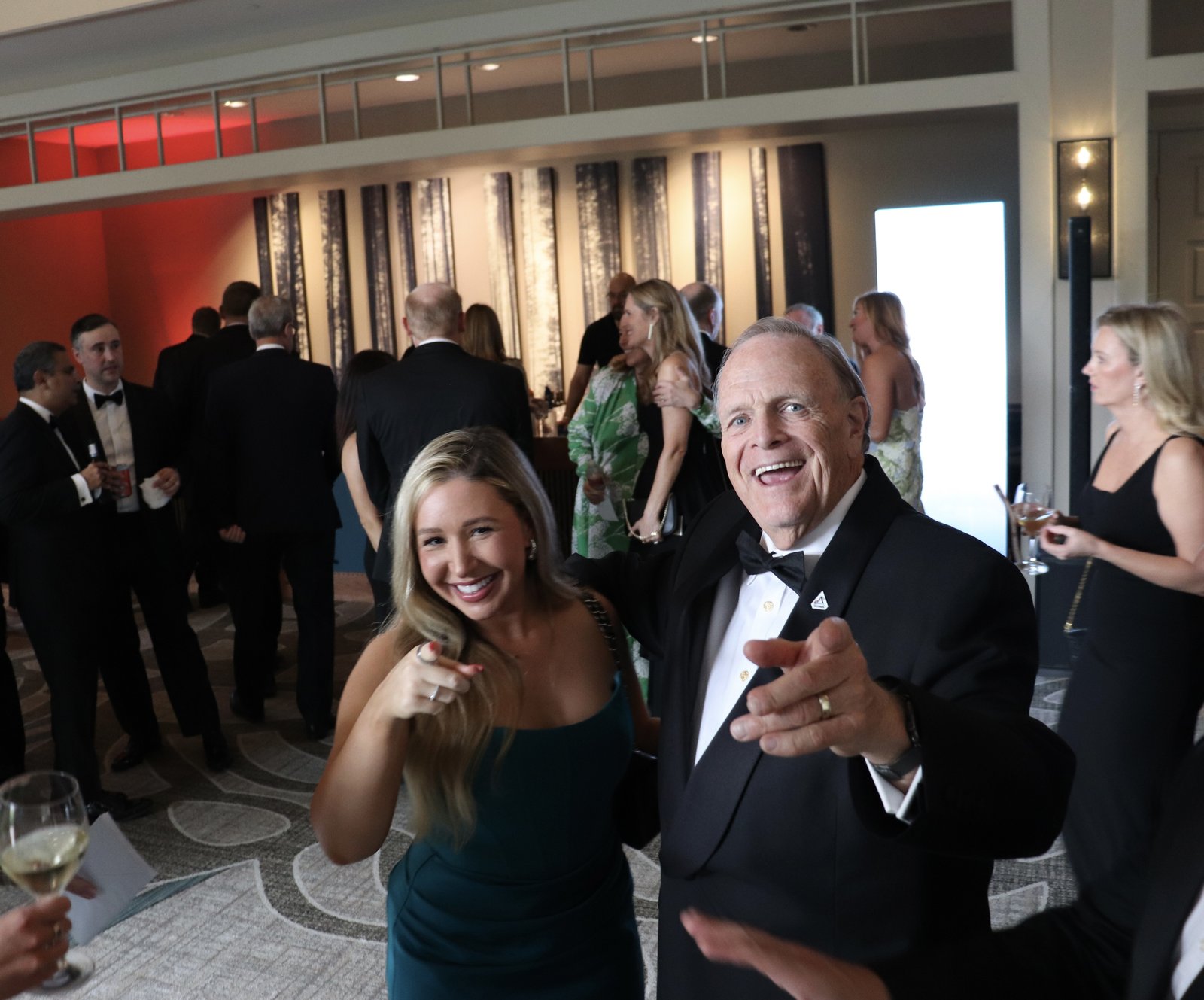 Laura Davis laughing with a fellow guest at the Senate Republican Caucus black-tie gala reception